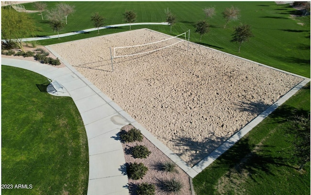 view of home's community featuring volleyball court