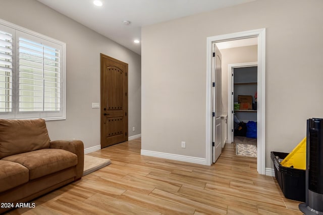 sitting room featuring light hardwood / wood-style flooring