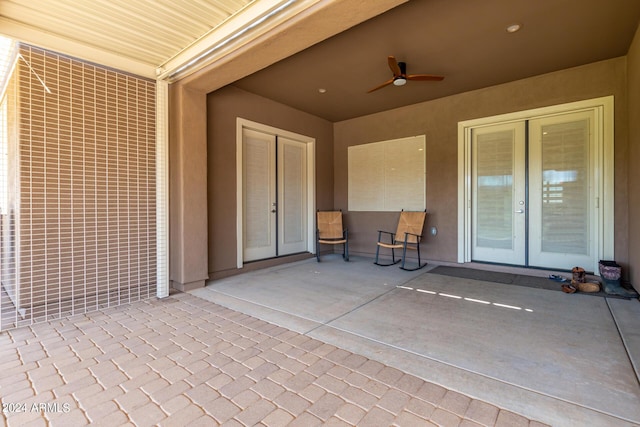 view of patio featuring ceiling fan and french doors