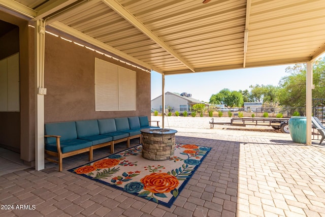 view of patio / terrace featuring a fire pit