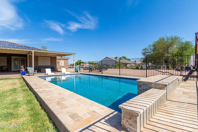 view of swimming pool featuring a patio