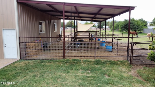 view of play area featuring an outdoor structure