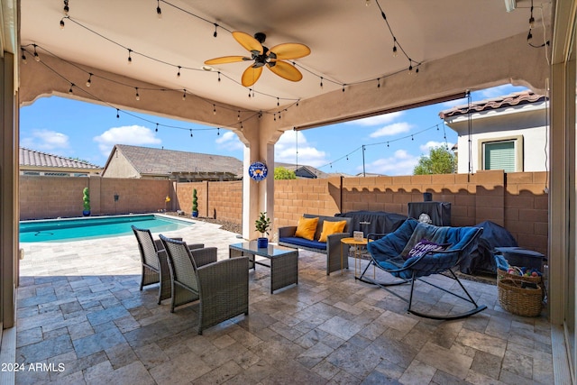 view of patio / terrace with ceiling fan, a fenced in pool, and an outdoor hangout area