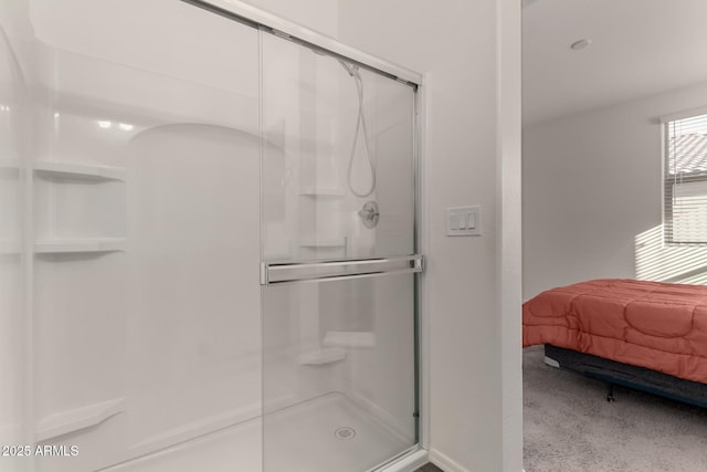 bathroom featuring an enclosed shower