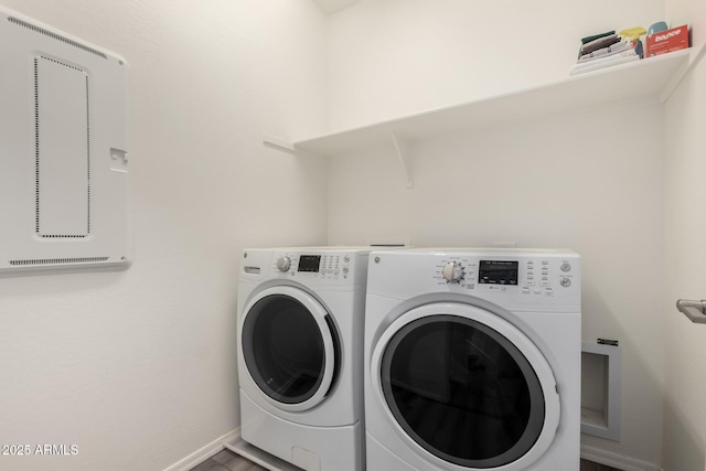 laundry room featuring separate washer and dryer