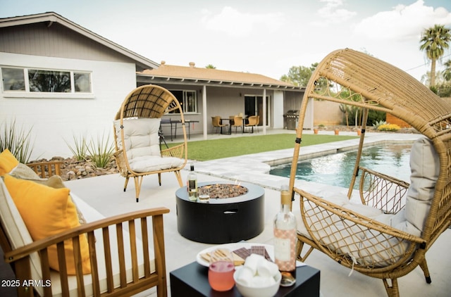 5541 E Cheery Lynn Rd, Phoenix, AZ 85018 - swimming pool featuring an outdoor living space with a fire pit and a patio