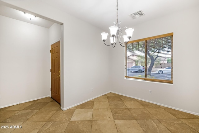 11702 W Lincoln St, Avondale, AZ 85323 - unfurnished room featuring a chandelier, baseboards, and light tile patterned floors