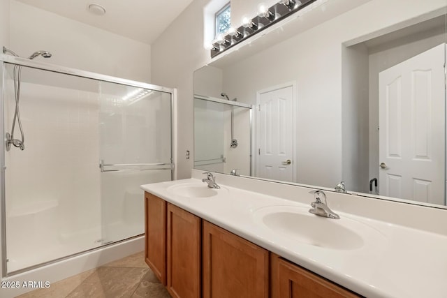 11702 W Lincoln St, Avondale, AZ 85323 - full bath with a shower stall, double vanity, and tile patterned flooring