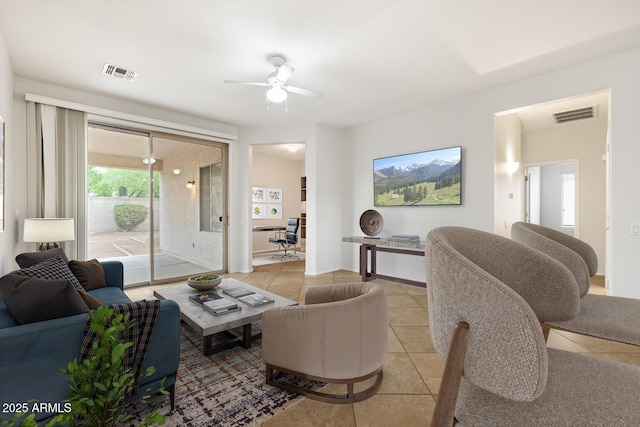 11702 W Lincoln St, Avondale, AZ 85323 - living area with light tile patterned floors and a ceiling fan