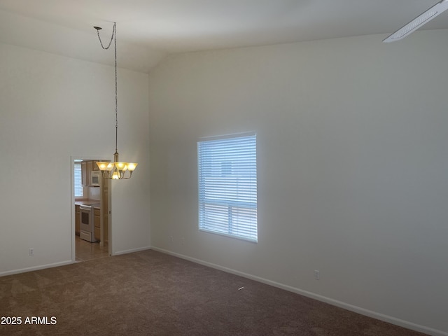11109 W Amelia Ave, Avondale, AZ 85392 - empty room featuring a chandelier, carpet flooring, and high vaulted ceiling