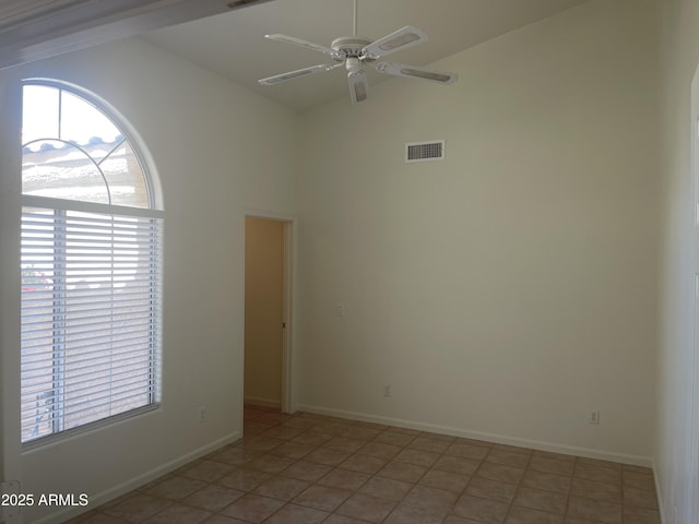 11109 W Amelia Ave, Avondale, AZ 85392 - unfurnished room featuring plenty of natural light, ceiling fan, high vaulted ceiling, and light tile patterned flooring
