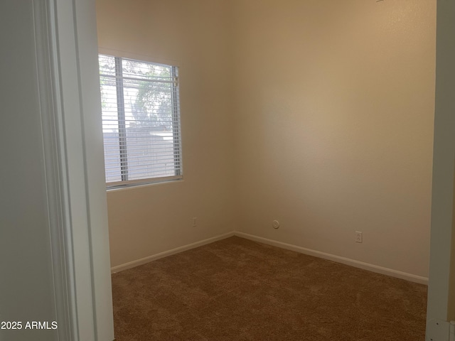 11109 W Amelia Ave, Avondale, AZ 85392 - carpeted empty room with plenty of natural light