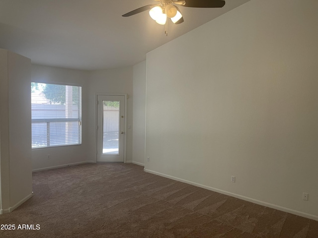 11109 W Amelia Ave, Avondale, AZ 85392 - unfurnished room with dark colored carpet and ceiling fan