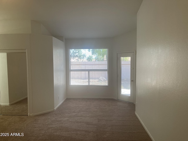 11109 W Amelia Ave, Avondale, AZ 85392 - spare room with carpet floors and baseboards