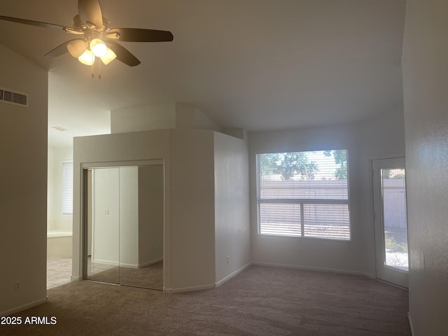 11109 W Amelia Ave, Avondale, AZ 85392 - unfurnished bedroom with carpet, a closet, ceiling fan, and ensuite bath