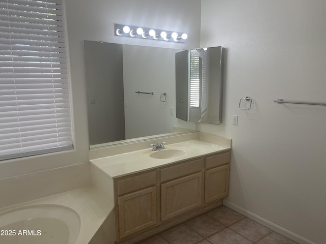 11109 W Amelia Ave, Avondale, AZ 85392 - bathroom featuring vanity, tile patterned flooring, and healthy amount of natural light