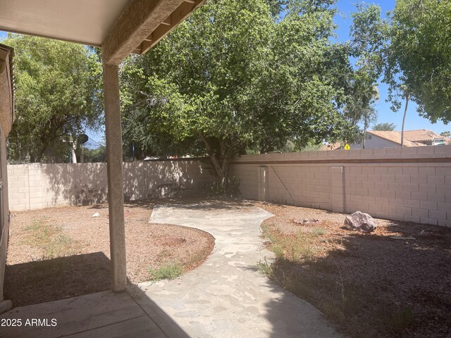 11109 W Amelia Ave, Avondale, AZ 85392 - fenced backyard featuring a patio area
