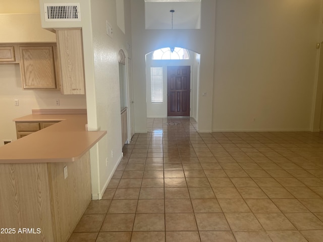 11109 W Amelia Ave, Avondale, AZ 85392 - foyer entrance featuring a towering ceiling and light tile patterned floors