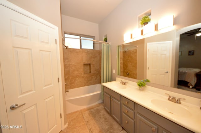 ensuite bathroom with shower / bath combo, tile patterned flooring, a sink, and double vanity