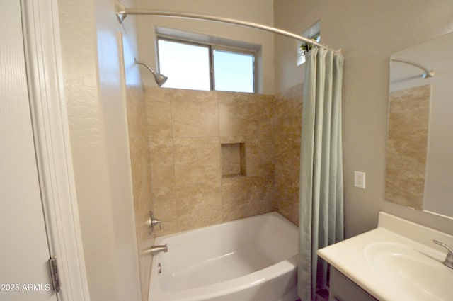 bathroom with vanity and shower / bath combo with shower curtain