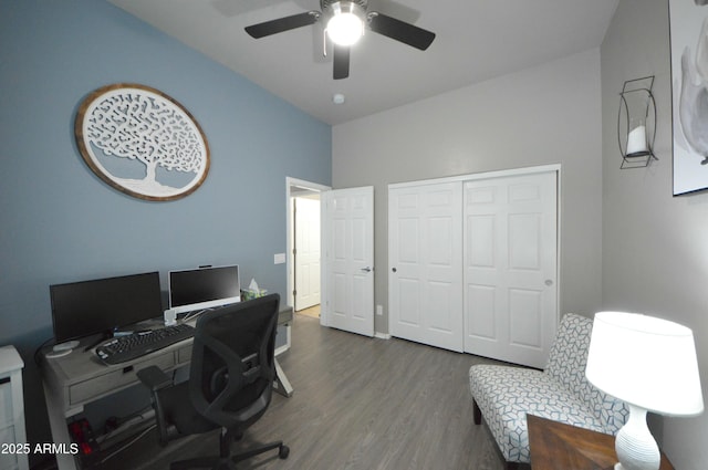 home office with ceiling fan and wood finished floors