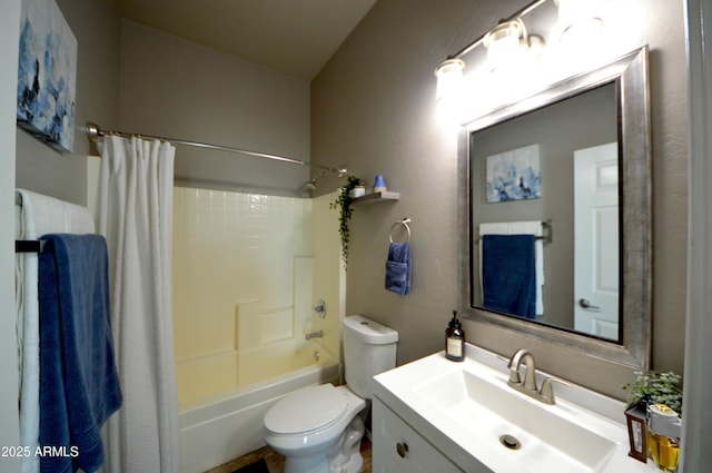 full bathroom with shower / tub combo, vanity, and toilet