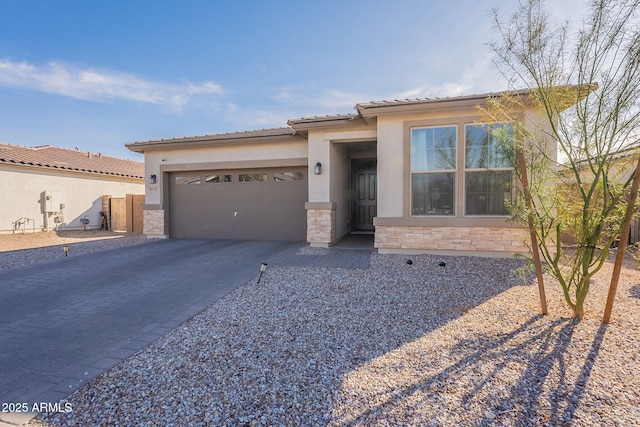 view of front of property with a garage