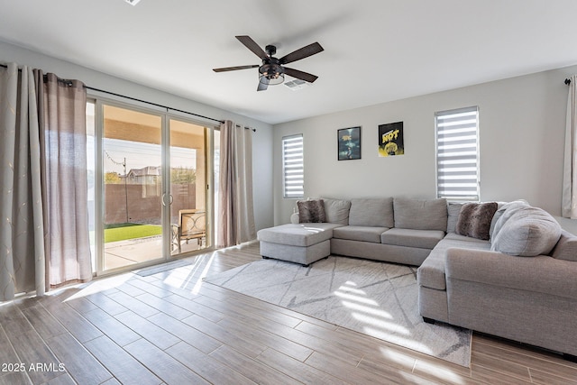 living room with ceiling fan