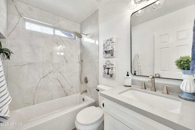 full bathroom featuring toilet, vanity, and bathing tub / shower combination