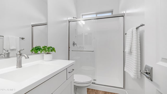 8140 E June St, Mesa, AZ 85207 - bathroom featuring vanity, a stall shower, and wood finished floors