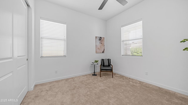 8140 E June St, Mesa, AZ 85207 - living area featuring light carpet and a ceiling fan
