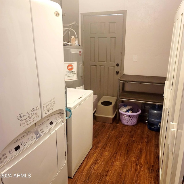 clothes washing area featuring laundry area, wood finished floors, independent washer and dryer, and electric water heater