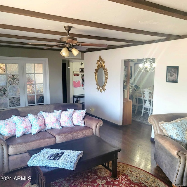 living area with beamed ceiling, a ceiling fan, and wood finished floors