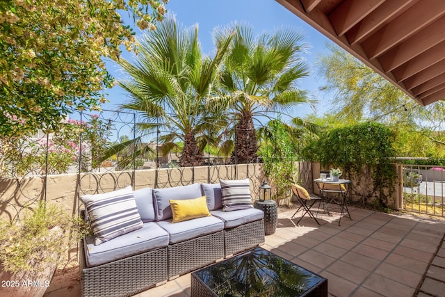 view of patio / terrace with fence and an outdoor hangout area