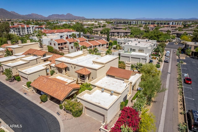 birds eye view of property featuring a mountain view and a residential view