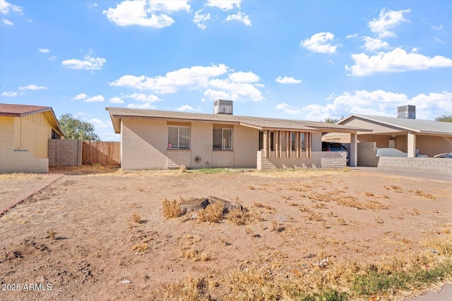 single story home with central air condition unit