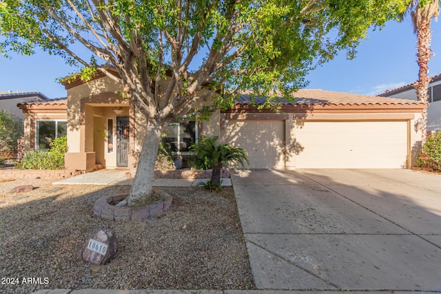 view of front of home with a garage