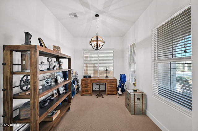 office space featuring visible vents, baseboards, carpet, and an inviting chandelier