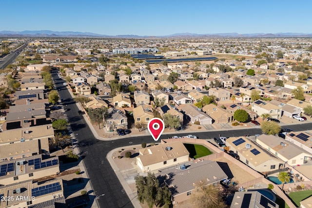 aerial view featuring a residential view and a mountain view