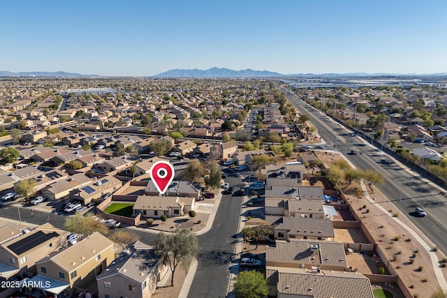 drone / aerial view with a mountain view and a residential view