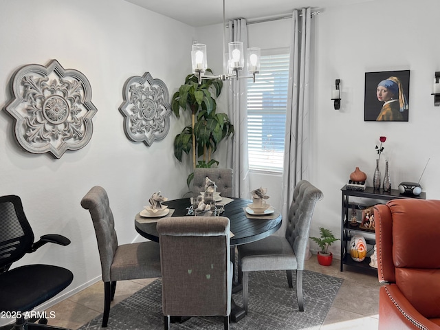 dining space featuring a notable chandelier