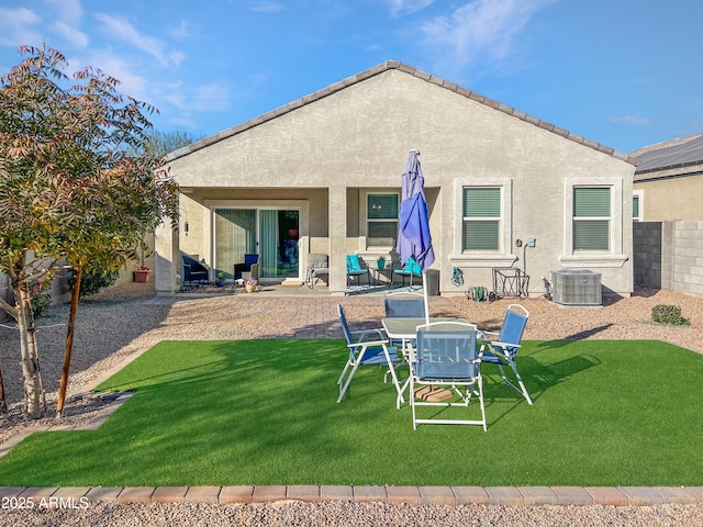 back of property featuring a yard, a patio, and central AC unit