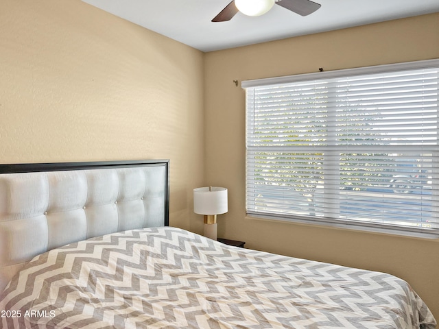 bedroom featuring ceiling fan