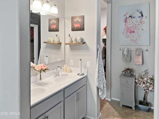 bathroom with tile patterned floors and vanity