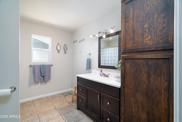 1531 S Padre Rd, Apache Junction, AZ 85119 - bathroom featuring vanity, tile patterned floors, and baseboards