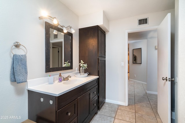 1531 S Padre Rd, Apache Junction, AZ 85119 - bathroom featuring vanity, tile patterned floors, and baseboards