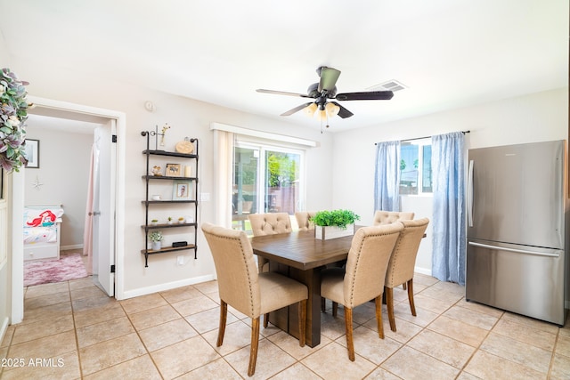 1531 S Padre Rd, Apache Junction, AZ 85119 - dining area featuring light tile patterned floors, a ceiling fan, and baseboards