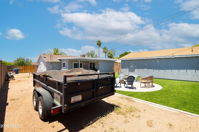 1531 S Padre Rd, Apache Junction, AZ 85119 - back of property featuring an outdoor fire pit and a patio