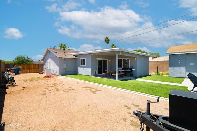 1531 S Padre Rd, Apache Junction, AZ 85119 - back of house with stucco siding and a patio area