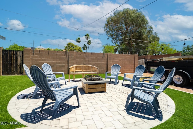 1531 S Padre Rd, Apache Junction, AZ 85119 - view of patio / terrace featuring an outdoor fire pit